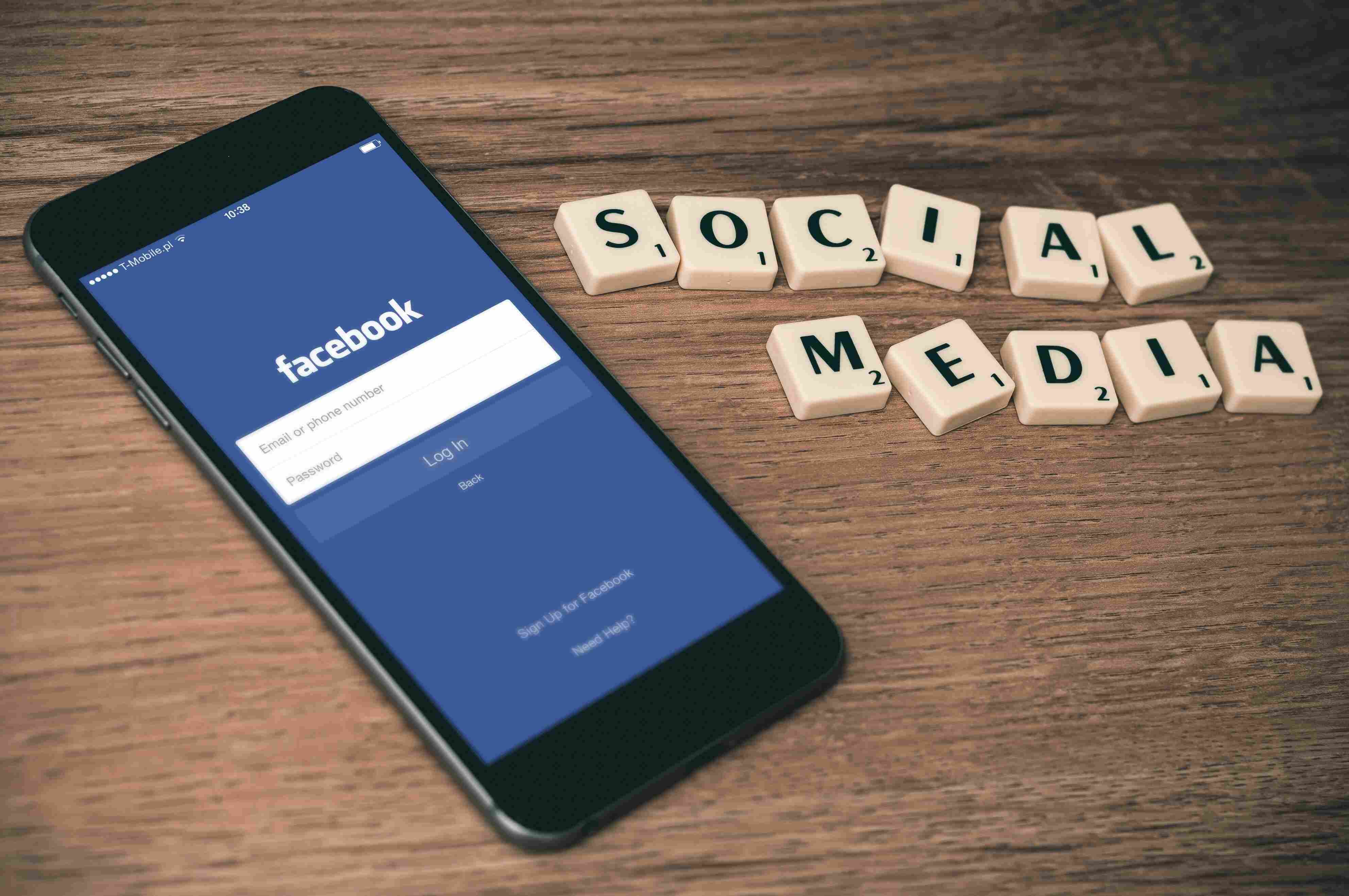 Social Media Spelled in Scrabble with Facebook Phone for Login